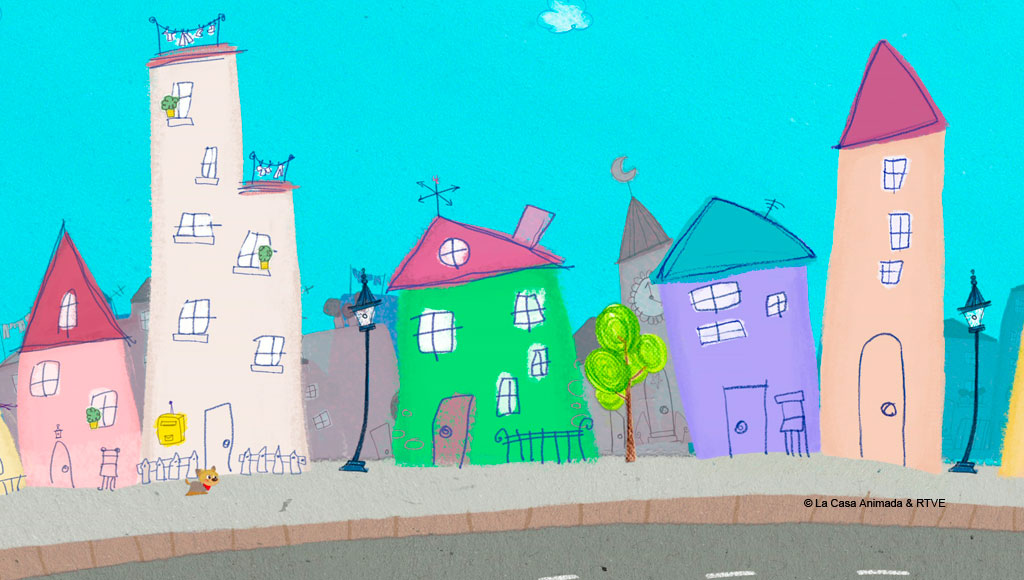 Edificios coloridos estilo dibujo animado bajo un cielo azul en Tenerife.
